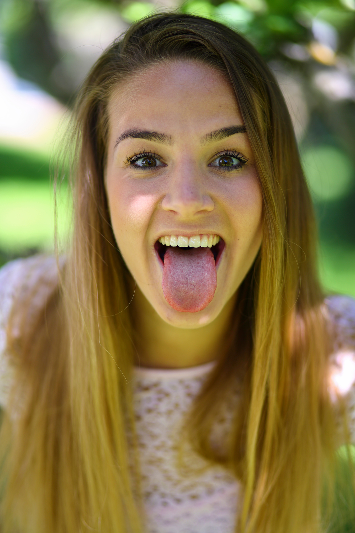 Young girl sticking out tounge